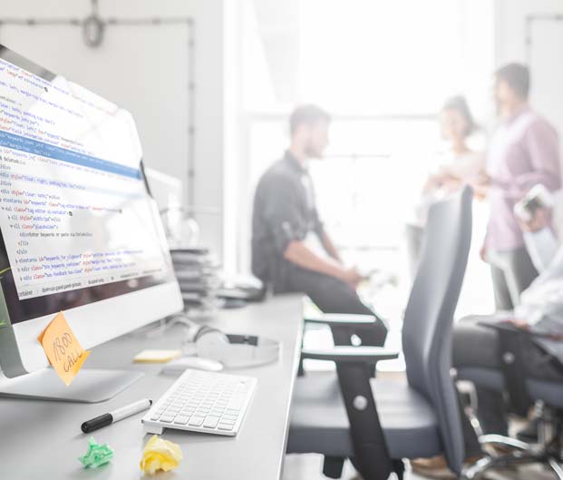 Top reasons to work with Digital Drive - team discussing a project in a contemporary office